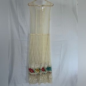 Free People floor length lace dress. Size medium. Condition new.